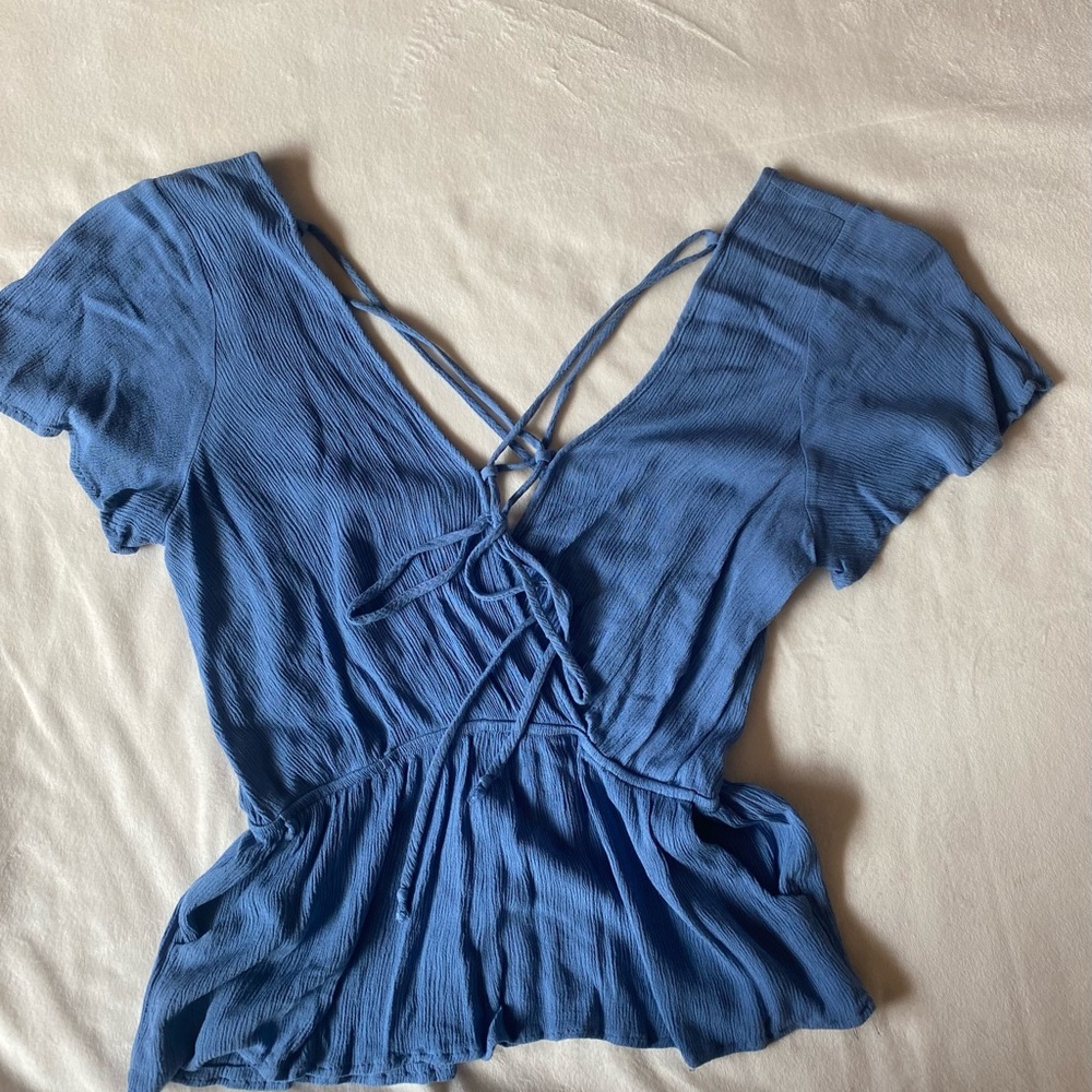 Solemio strappy top with open plunge back.